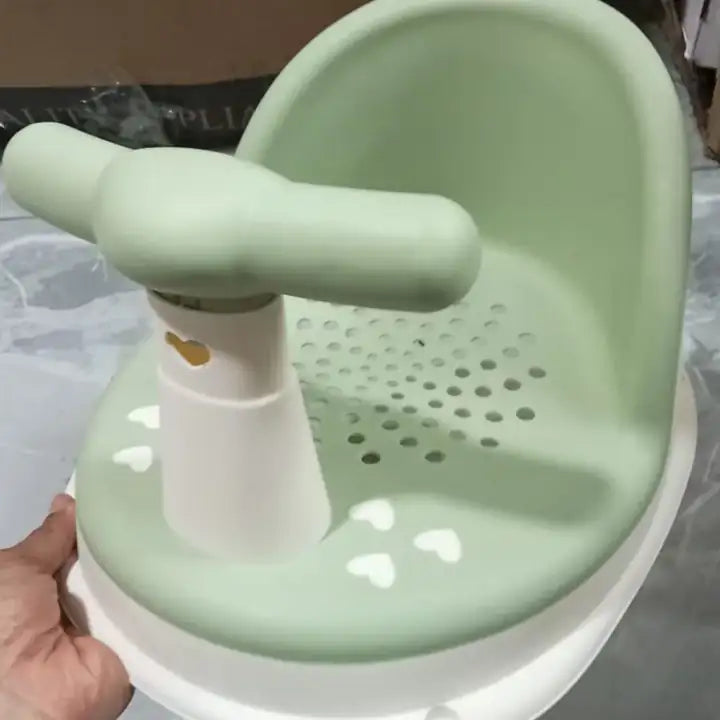 Foto real de la silla de baño verde con agujeros de drenaje